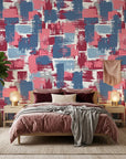 Painted Horizon abstract blue and pink wallpaper adding character to a cozy bedroom