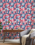 Painted Horizon abstract blue and pink wallpaper as a feature wall in a bright home office