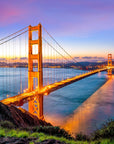 Golden Gate Bridge at sunset wallpaper with purple and orange sky over San Francisco Bay