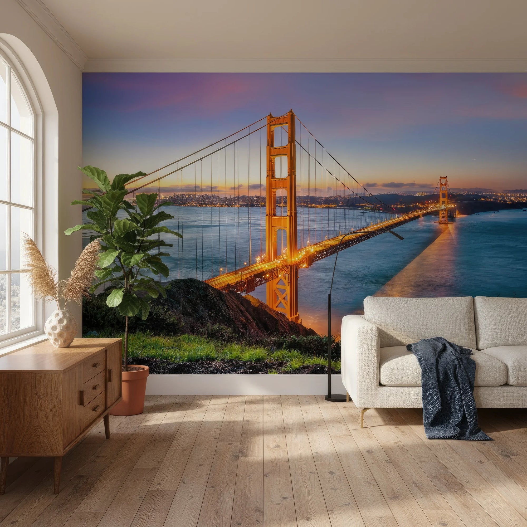 Golden Gate Bridge at sunset mural wallpaper on living room accent wall with purple and orange sky