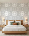 Pale Geo quiet geometric balance wallpaper adding character to a cozy bedroom
