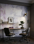 Pale Reverie soft lavender abstract brushstroke wallpaper adding character to a cozy bedroom
