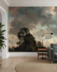 Dramatic painterly landscape wallpaper with stormy skies and dark trees on modern living room accent wall