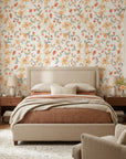 Peach Bloom coral floral peel and stick wallpaper in a warm and inviting living room