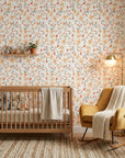 Peach Bloom coral floral peel and stick wallpaper adding character to a cozy bedroom