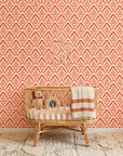 Peach Blossom coral and blush scallop floral wallpaper adding character to a cozy bedroom