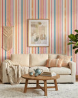 Peach & Flame retro stripe peel and stick wallpaper in a warm and inviting living room