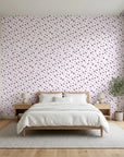 Pepper Blush delicate black ditsy floral wallpaper adding character to a cozy bedroom