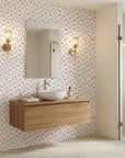 Pepper Blush delicate black ditsy floral wallpaper creating ambiance in a serene bathroom