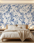 Periwinkle Blossom elegant blue floral wallpaper adding character to a cozy bedroom