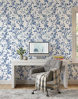 Periwinkle Blossom elegant blue floral wallpaper as a feature wall in a bright home office