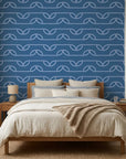 Periwinkle Drift blue dotted wave wallpaper creating ambiance in a serene bathroom
