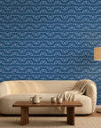 Periwinkle Drift blue dotted wave wallpaper in a warm and inviting living room