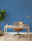 Periwinkle Drift blue dotted wave wallpaper as a feature wall in a bright home office