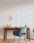 Periwinkle Shores blue geometric peel and stick wallpaper as a feature wall in a bright home office