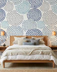 Petal Cascade blue swirls peel and stick wallpaper adding character to a cozy bedroom