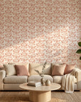 Petal Silence blush botanical peel and stick wallpaper in a warm and inviting living room