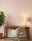 Petal Silence blush botanical peel and stick wallpaper as a feature wall in a bright home office