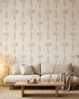 Petal & Thread elegant golden botanical floral wallpaper in a warm and inviting living room