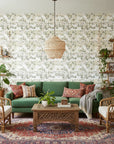 Petal Branch Sketch delicate blush botanical wallpaper in a warm and inviting living room