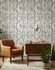 Pewter Array modern abstract grey peel and stick wallpaper as a feature wall in a bright home office