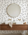 Pewter Leaf textured gray botanical wallpaper creating ambiance in a serene bathroom