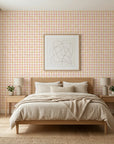 Picnic Check yellow and pink plaid wallpaper adding character to a cozy bedroom