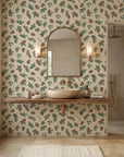 Pine & Frost green botanical peel and stick wallpaper creating ambiance in a serene bathroom