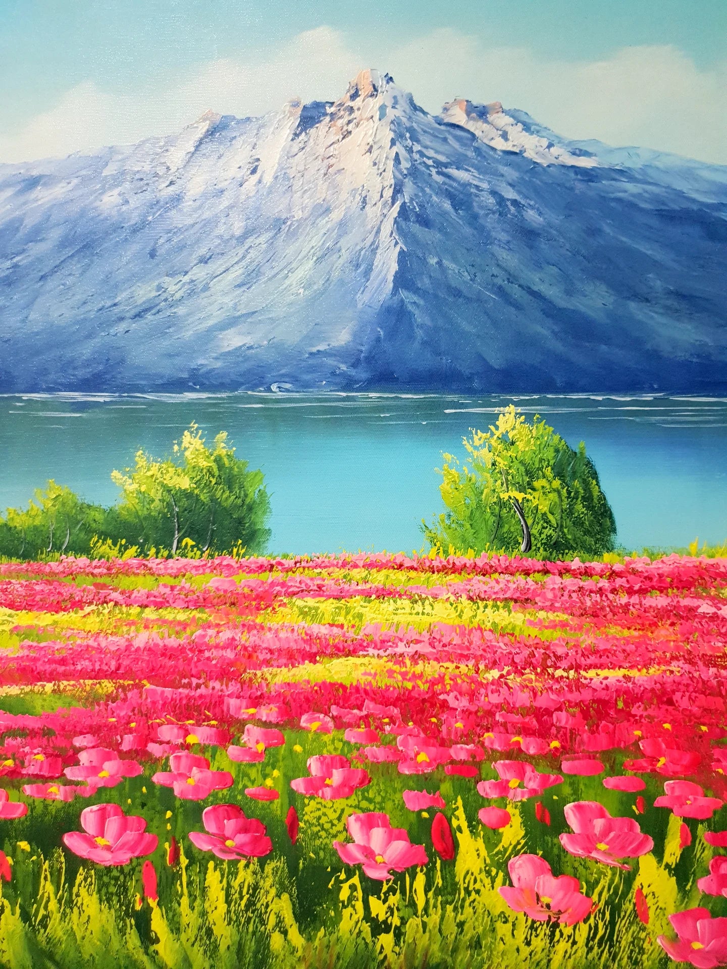 Pink Ascent bold mountain and wildflower meadow wallpaper creating ambiance in a serene bathroom
