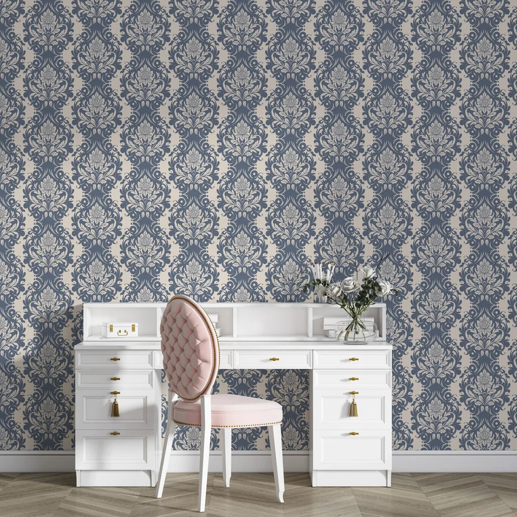 Blue and beige Poet's Blossom damask wallpaper behind elegant white vanity desk with pink tufted chair