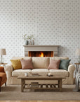 Poppy Ribbon playful blue striped floral wallpaper in a warm and inviting living room