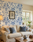 Porcelain Garden elegant blue chinoiserie floral wallpaper in a warm and inviting living room
