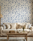 Porcelain Garden blue and white hummingbird floral wallpaper in a warm and inviting living room
