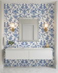Porcelain Garden elegant blue chinoiserie floral wallpaper creating ambiance in a serene bathroom