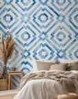 Blue porcelain style watercolor diamond wallpaper with hand painted geometric shapes forming a repeating lattice pattern on a white background.