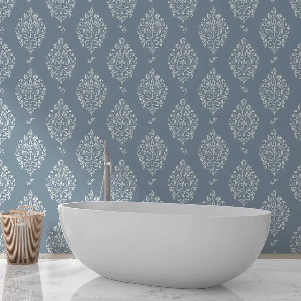 Porcelain Bouquet damask wallpaper in slate blue with silver motifs behind freestanding bathtub