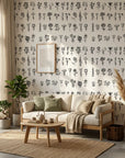 Pressed Botanicals black and white wildflower wallpaper in a warm and inviting living room
