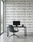 Pressed Botanicals black and white wildflower wallpaper as a feature wall in a bright home office