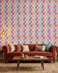 Prism Weave colorful geometric peel and stick wallpaper in a warm and inviting living room
