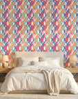 Prism Weave colorful geometric peel and stick wallpaper adding character to a cozy bedroom