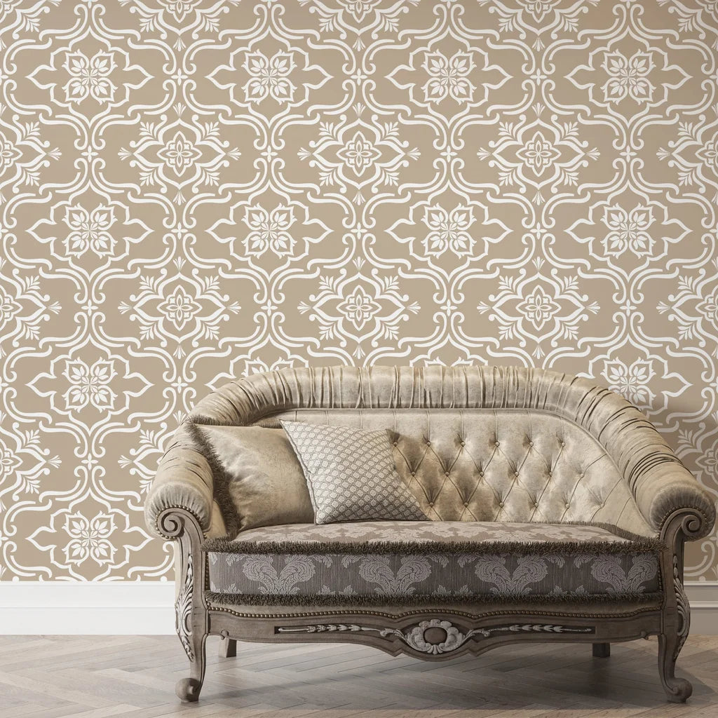 Pure Fern Fantasy removable wallpaper in taupe and cream creating elegant damask pattern behind vintage sofa
