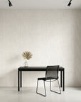 Quiet Cloth serene beige linen texture wallpaper as a feature wall in a bright home office