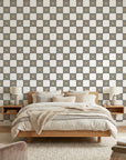 Quiet Game grey and white checkerboard wallpaper in a warm and inviting living room