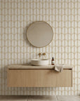Quiet Grace gold and cream minimalist arc wallpaper as a feature wall in a bright home office
