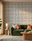 Quiet Herringbone neutral abstract peel and stick wallpaper in a warm and inviting living room