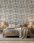 Quiet Herringbone neutral abstract peel and stick wallpaper adding character to a cozy bedroom