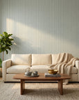 Quiet Shore serene blue abstract wallpaper in a warm and inviting living room
