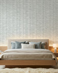 Quiet Shore serene blue abstract wallpaper adding character to a cozy bedroom