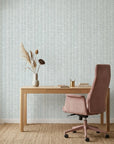 Quiet Shore serene blue abstract wallpaper as a feature wall in a bright home office