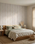Rain Veil soft taupe vertical stripe wallpaper adding character to a cozy bedroom